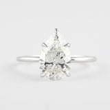 Colorless Moissanite Pear Cut Solitaire Engagement Ring