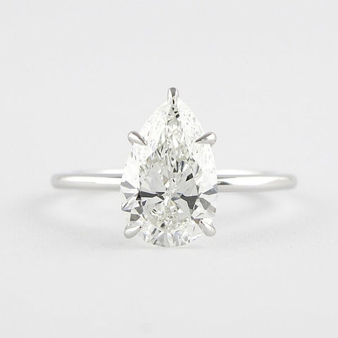 Colorless Moissanite Pear Cut Solitaire Engagement Ring