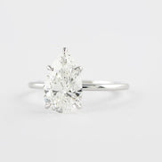 Colorless Moissanite Pear Cut Solitaire Engagement Ring