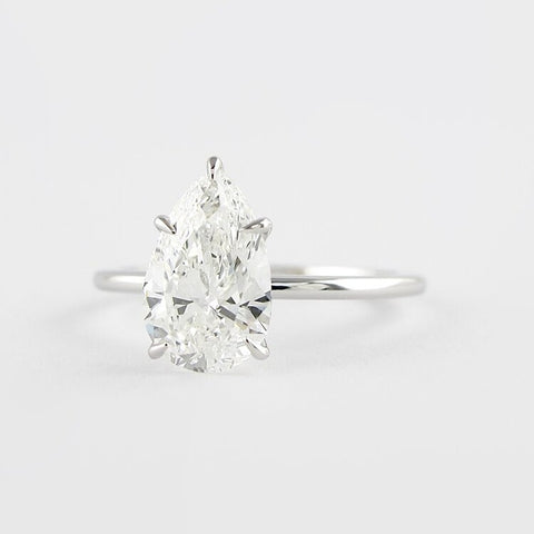 Colorless Moissanite Pear Cut Solitaire Engagement Ring