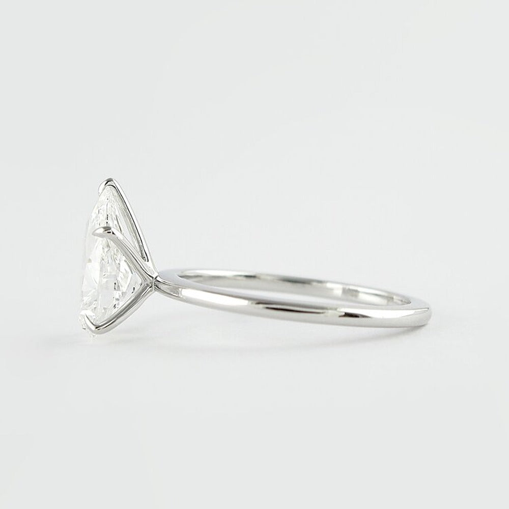 Colorless Moissanite Pear Cut Solitaire Engagement Ring