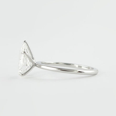 Colorless Moissanite Pear Cut Solitaire Engagement Ring