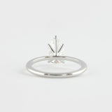 Colorless Moissanite Pear Cut Solitaire Engagement Ring