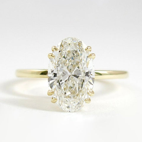 Oval Cut Solitaire Double Claw Prong Moissanite Proposal Ring