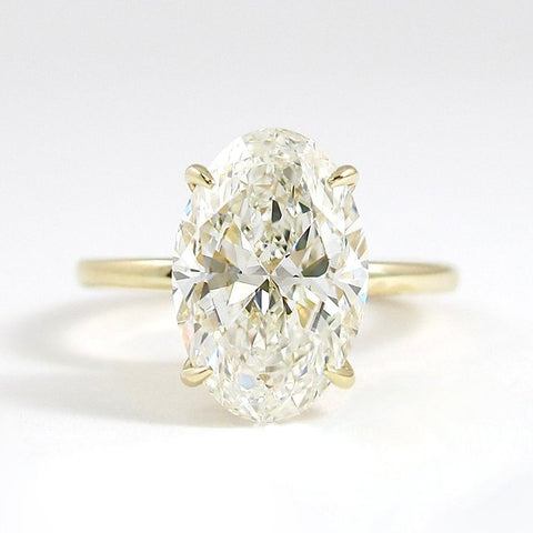 Hidden Accent Colorless Moissanite Oval Cut Ring