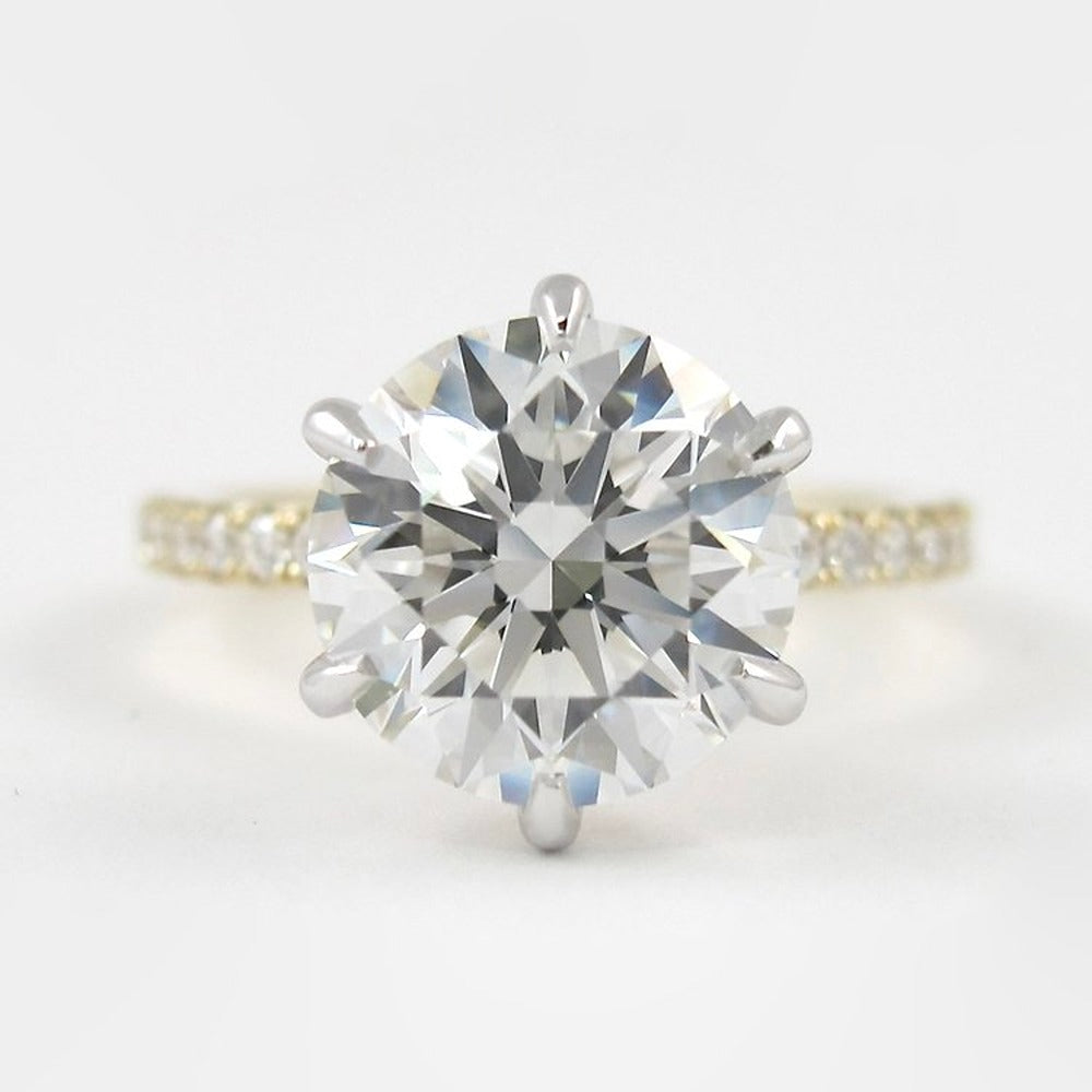 Two Tone D Color Moissnaite Round Cut Side Accent Engagement Ring