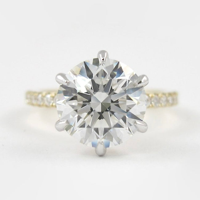 Two Tone D Color Moissnaite Round Cut Side Accent Engagement Ring