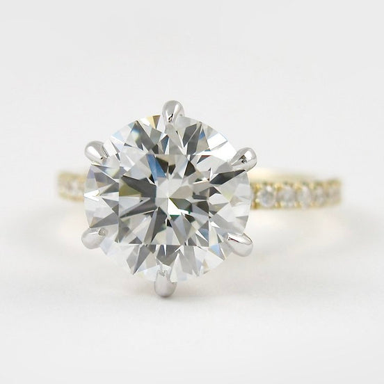 Two Tone D Color Moissnaite Round Cut Side Accent Engagement Ring