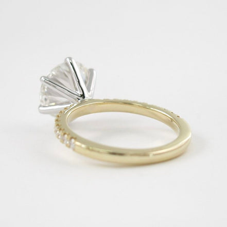 Two Tone D Color Moissnaite Round Cut Side Accent Engagement Ring
