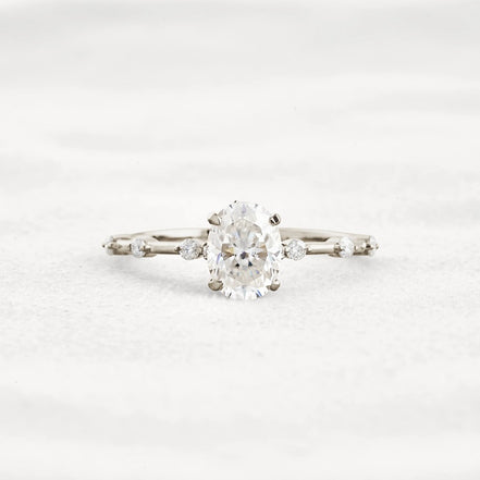 Hidden Accent Oval Cut Moissanite Wedding Ring