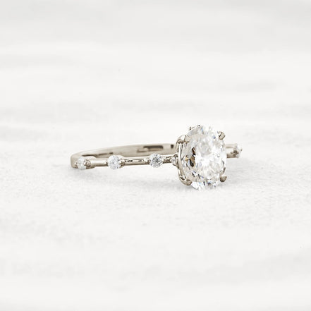 Hidden Accent Oval Cut Moissanite Wedding Ring