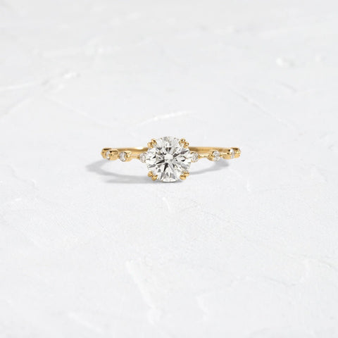 Moissanite Hidden Accent Round Cut Engagement Ring