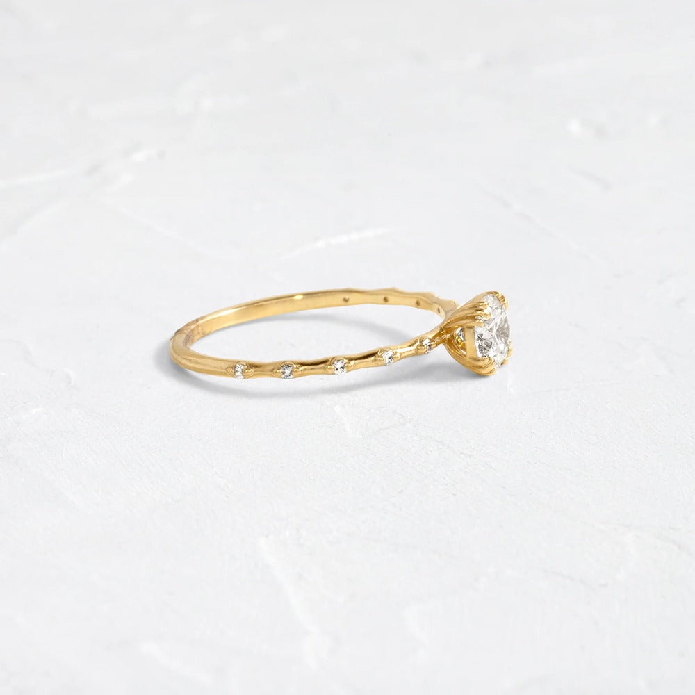 Side Accent Round Cut Moissanite Promise Ring