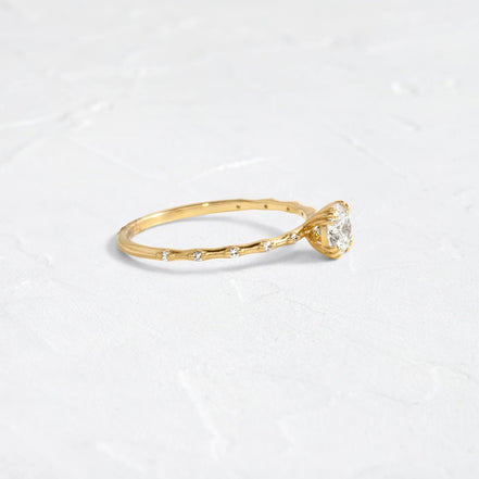 Side Accent Round Cut Moissanite Promise Ring