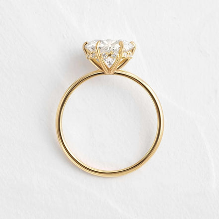 Round Cut Hidden Accent Moissanite Engagement Ring