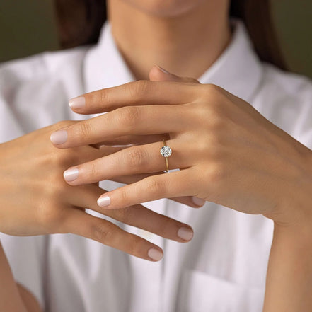 Round Cut Hidden Accent Moissanite Engagement Ring