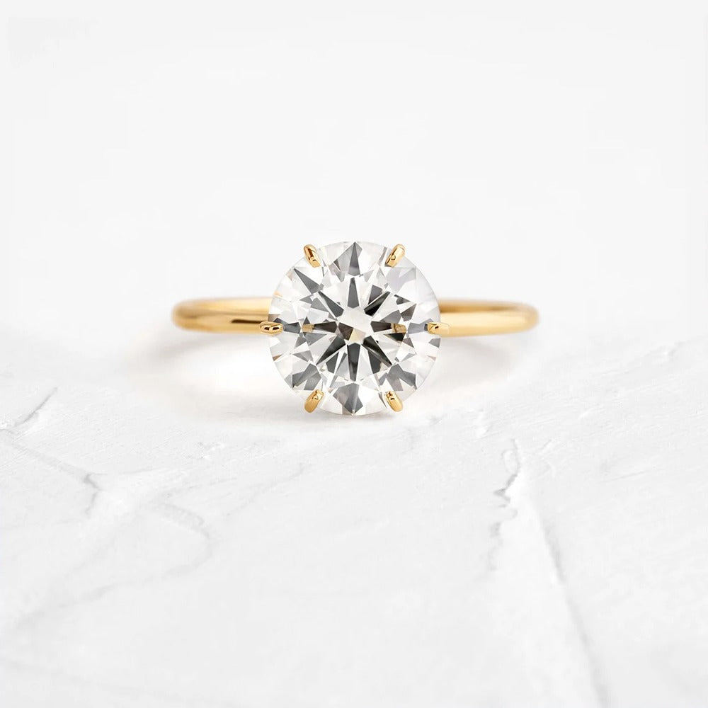 Round Cut Hidden Accent Moissanite Engagement Ring