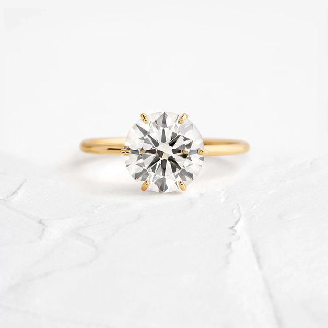 Round Cut Hidden Accent Moissanite Engagement Ring