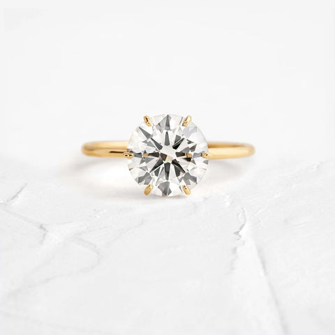 Round Cut Hidden Accent Moissanite Engagement Ring