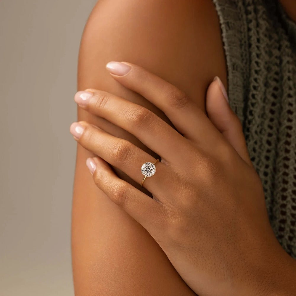 Round Cut Hidden Accent Moissanite Engagement Ring